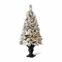 Best deal 👍 4ft. Pre-Lit Flocked Pine Artificial 🎄 Christmas Tree in Planter, Warm White LED Lights by Glitzhome ✔️